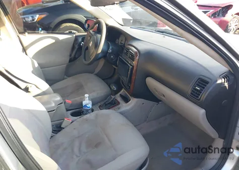 2003 Saturn L-Series L200 из США, поврежденный, VIN 1G8JU54F43Y537183